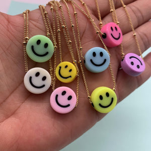 Smiley face gold chain necklace