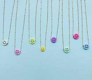 Smiley face gold chain necklace