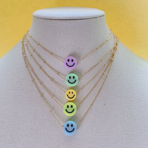Smiley face gold chain necklace