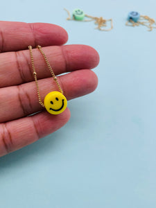 Smiley face gold chain necklace