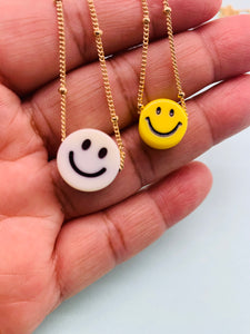 Smiley face gold chain necklace