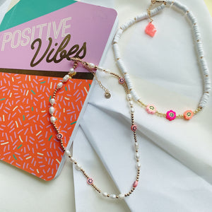Smiley face pearl necklace