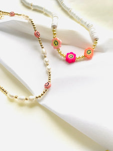 Smiley face pearl necklace