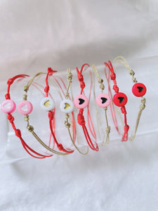 Beaded red string  heart bracelet