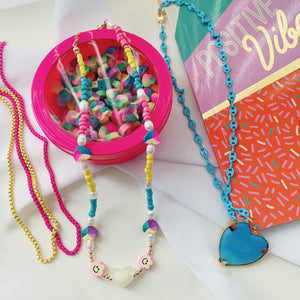 Smiley face pearl necklace