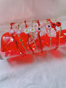 Beaded red string  heart bracelet