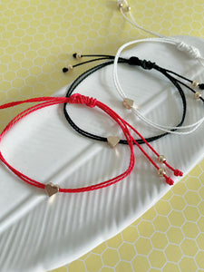 Tiny heart string bracelets